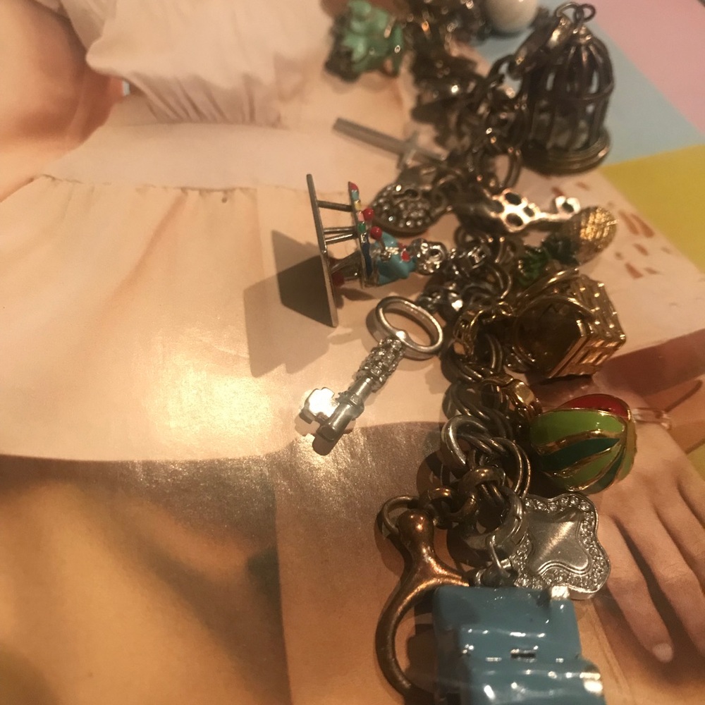 Fossil bracelet and charms. Used but has life.